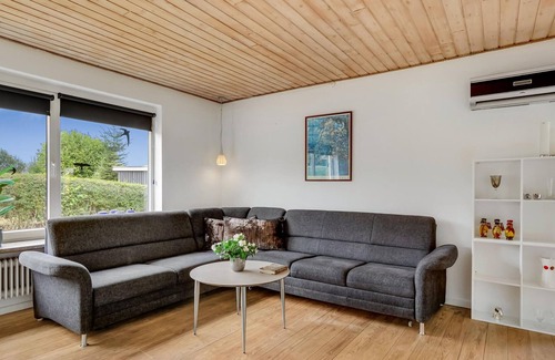 Haderslev Apartment | A few kilometers from the sea, you will find this beautiful vacation home in Diernæs Strand.