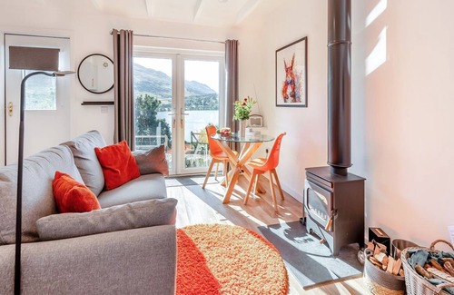 Lochearnhead Cottage | A gorgeous, cosy, modern cottage with breathtaking views over Loch Earn.