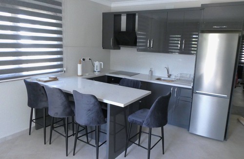 Dalyan City Center Apartment | A Ground Floor Apartment With Shared Pool In Well Tended Grounds