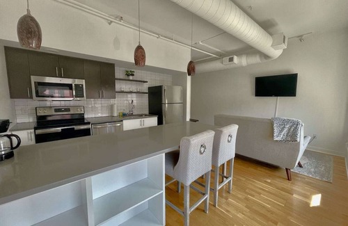 Downtown Omaha Apartment | A historic 900 square foot Atrium loft in the heart of the Old Market