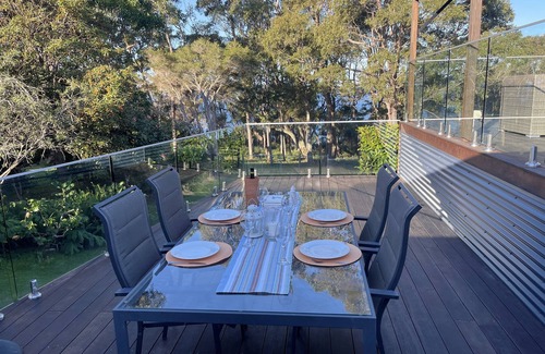 Malua Bay House | A lovely cosy cottage with a delightful double deck to enjoy the views