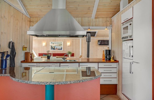 Lyngsbæk Strand House | A magnificent panorama awaits you in this beautiful vacation home.