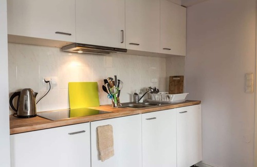Mokotow Condo | A modern city apartment with good views.
