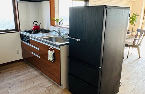 Yunokawa Onsen Apartment | A panoramic view of Lake ShinjiSpacious living s/Matsue Shimane