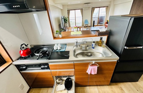 Yunokawa Onsen Apartment | A panoramic view of Lake ShinjiSpacious living s/Matsue Shimane