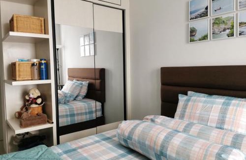 Depok Apartment | A Peaceful Room at Barsacity Apartment by Ciputra