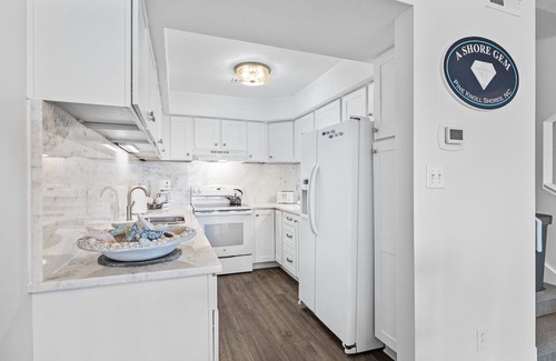 Pine Knoll Shores Condo | A Shore Gem-Oceanfront! Pool right out the front door! (2 week bookings only)