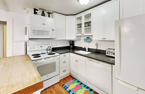 Savannah Beach House | A Shore Thing | Vintage Beach House, Fenced-In Yard + Pet Friendly!