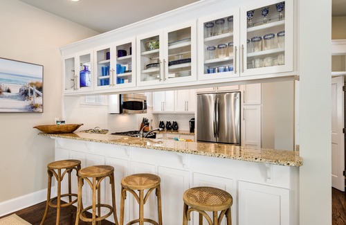 Sunnyside House | A Stone's Throw - Carillon Beach across from one of 3 pools, 3-min walk to beach