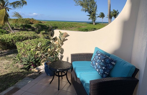 Wheeland Settlement Condo | A TRUE OCEAN FRONT view from couch & kitchen ground floor 2 patios quiet corner