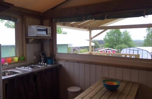 Henansal Cabin | A two bedroom luxury lodge with extra cabin beds, heated covered pool