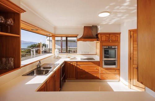 Raumati South House | Absolute Beach Front Luxury Holiday Home Swim Beach Spectacular Sunsets