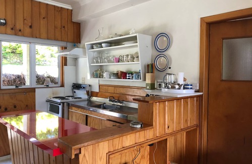 Wanaka House | Absolute Lakefront quirky sixties Unit, spectacular lake and mountain views.