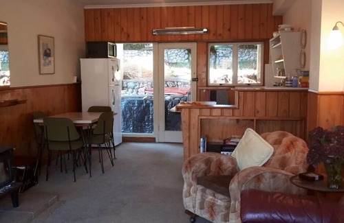 Wanaka House | Absolute Lakefront quirky sixties Unit, spectacular lake and mountain views.