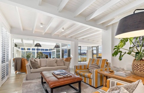 Kelvin Heights House | Absolute water front property with pool and hot tub