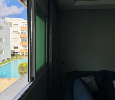 Achakkar Apartment | Achakkar Hills Seaside Family Apartment with Pool, Beach Access, AC, Parking, Play Area
