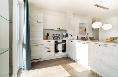 Schillig Apartment | "Achtern Diek" - Holiday apartment with sea view and private sauna by the North Sea