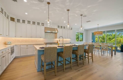 Anna Maria House | AcquaLuxe – AMI Luxury Canal-Front w/Pool, Spa & Dock Near Beaches