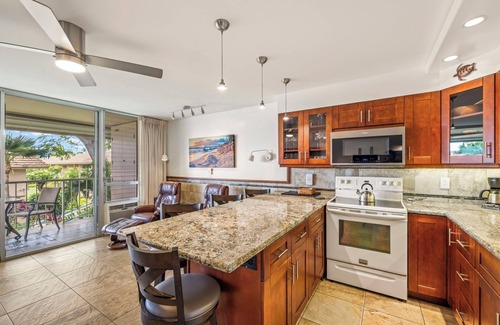Kihei Condo | Across from Kamaole 2 Beach, concrete building, well maintained.