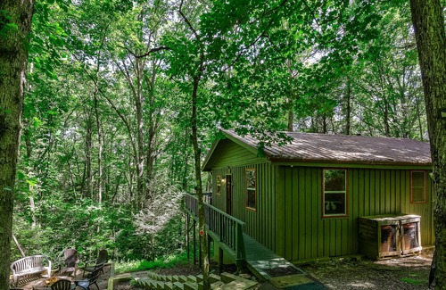 Cashes Valley Cabin | Adorable cabin w/ a private hot tub, screened porch, firepit, & forest views