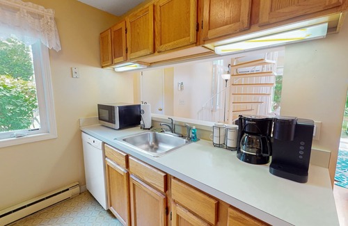 Brewster Condo | Adorable condo with patio, shared pool, & hot tub - close to the water