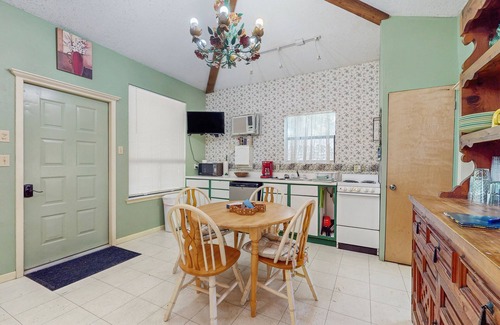 Ingram House | Adorable dog-friendly cottage with screened porch, grill, pool, kitchenette