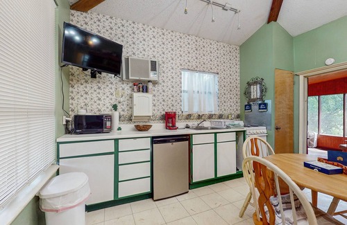 Ingram House | Adorable dog-friendly cottage with screened porch, grill, pool, kitchenette