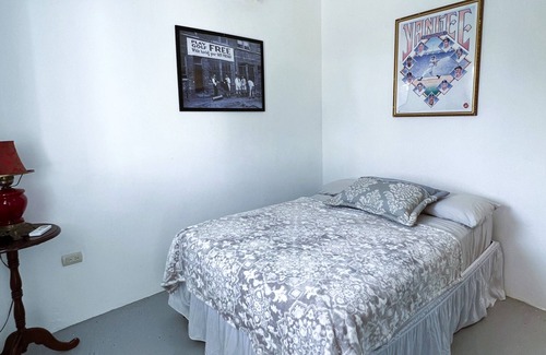 Cabrera Hotel | Adorable room with a pool, fire pit, gardens, and more- close to the beach!