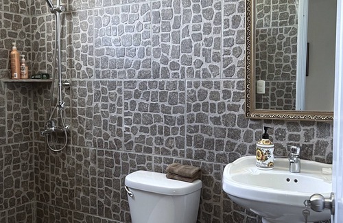Cabrera Hotel | Adorable room with a pool, fire pit, gardens, and more- close to the beach!