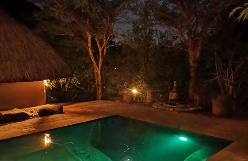 Lanseria Ski Chalet | Adorable unique guest house - African bush feel.