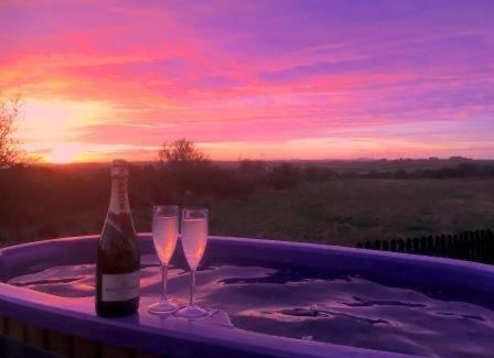 Rhosybol House | Adult only en-suite Glamping Hut with a Private Hot Tub, Fenced Garden, FirePit, BBQ and Dog Friendly! Located in a Peaceful setting with gorgeous countryside views on Anglesey, North Wales