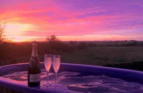 Rhosybol House | Adult only en-suite Glamping Hut with a Private Hot Tub, Fenced Garden, FirePit, BBQ and Dog Friendly! Located in a Peaceful setting with gorgeous countryside views on Anglesey, North Wales