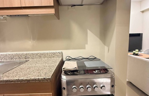 Kapitolyo Condo | Aesthetic Cozy Apartment Condo with pool balcony & deck