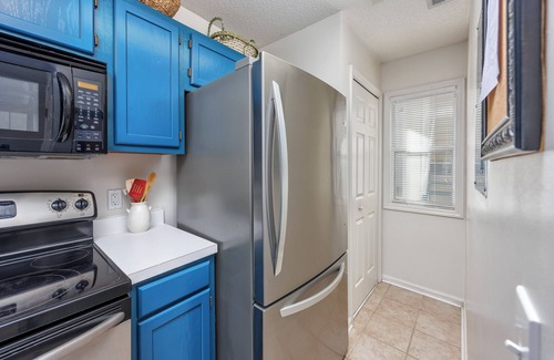 North Myrtle Beach Condo | Affordable cozy 2 bedroom condo 1st floor screened in patio in gated community.