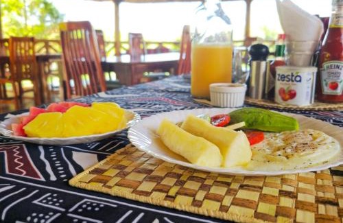 Entebbe Bed & Breakfast | African Roots Guesthouse Entebbe