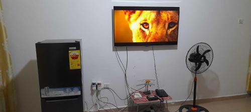 Accra Apartment | Afrikan Tomraic Guest Lodge 2 BedRooms with Kitchen East Legon KFC Wi-Fi Dstv Water Best Lowest Price New 1