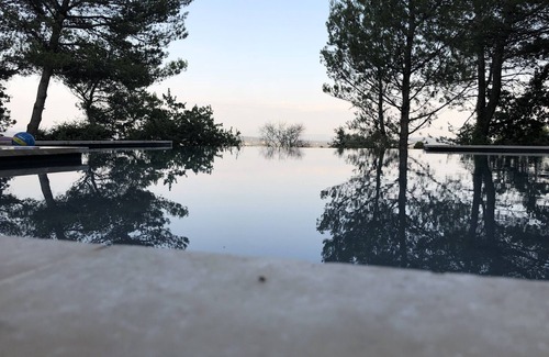 Saint-Marcel-d'Aredeche House | Air-conditioned wooden gîte on stilts with heated swimming pool, animals accepted