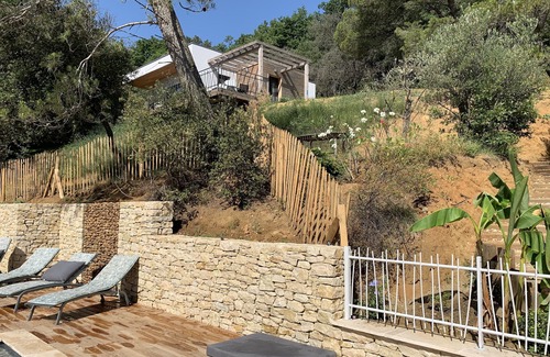 Saint-Marcel-d'Aredeche House | Air-conditioned wooden gîte on stilts with heated swimming pool, animals accepted
