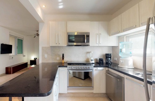 Playa del Carmen Apartment | Air-conditioned condo with strong WiFi, pool, river pool & tropical gardens