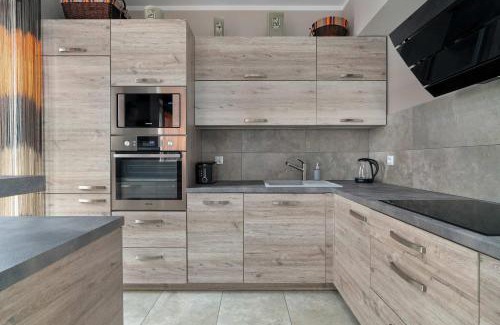 Stare Miasto District Apartment | Air-conditioned Apartment in Poznań with Parking by Noclegi Renters