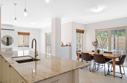 Wembley House | Air conditioned house near city and beach with secure garage