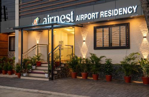 Alwaye Hotel | AIRNEST Airport Residency