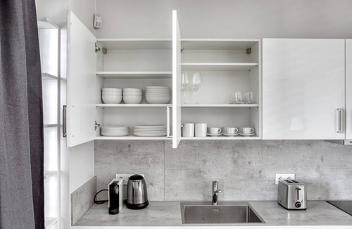 Gasperich Apartment | Airy Gasperich Studio w/Elevator, nr bus station, by Blueground