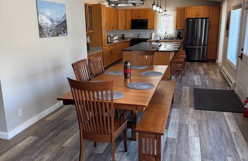 Eagle River House | Alaska Hiland Mountain Retreat wrap around deck and hot-tub!