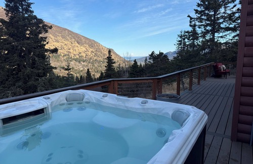 Eagle River House | Alaska Hiland Mountain Retreat wrap around deck and hot-tub!