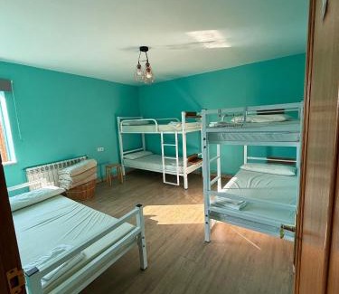 Portomarin Hostel | ALBERGUE Pasiño A Pasiño