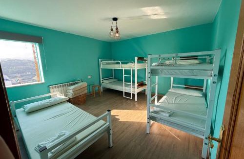 Portomarin Hostel | ALBERGUE Pasiño A Pasiño