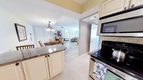 Mid Beach House | Alexander 511 Beachfront condo with 2 pools, direct beach access, sauna, tikki bar