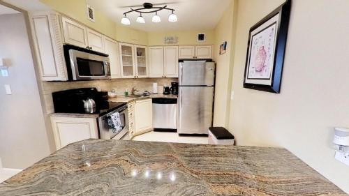 Mid Beach House | Alexander 511 Beachfront condo with 2 pools, direct beach access, sauna, tikki bar