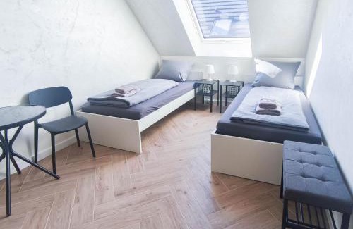 Stuttgart House | ALFA Stuttgart Doppelzimmer Teeküche Porsche Bosch l Gemeinschaftsbad WIFI SmartTV l Double room with kitchenette and shared bathroom BS21A8